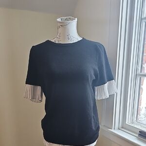 Chic Black Top with Pleated Sleeves
